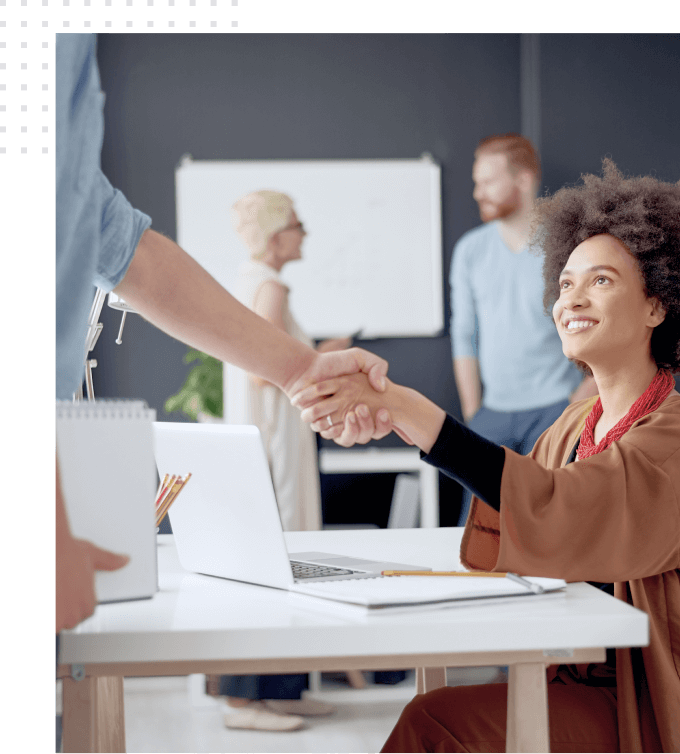 A man and a woman handshaking